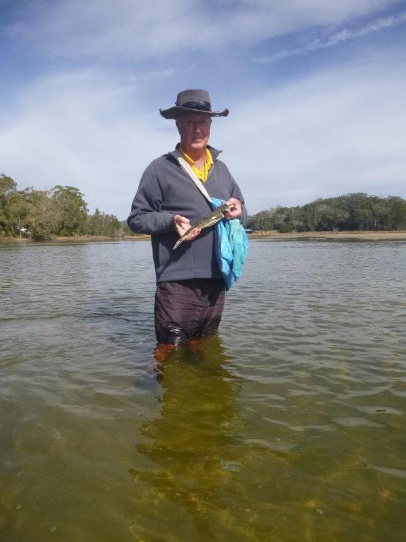 Rodney with his flat-head he caught at Lake Cathie