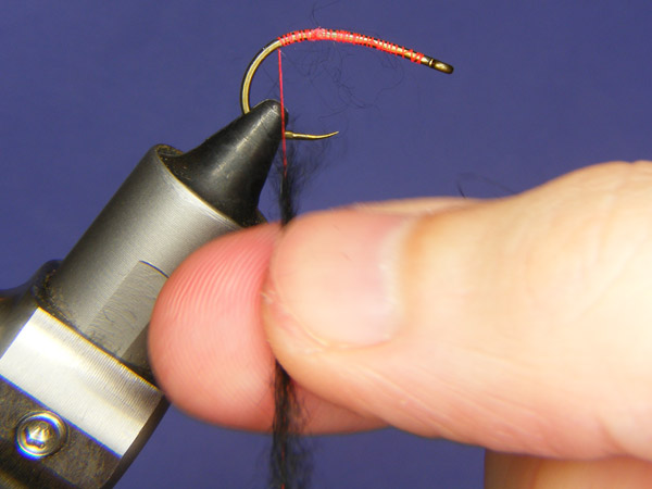 Dubbing material to the hook