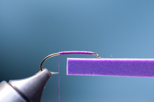 Cut a strip of 2mm craft foam. Strip of foam should be width of gap of hook and 2″ long.