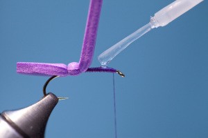 Apply some super-glue to thread wraps as shown.