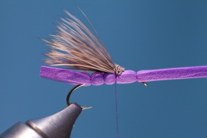 Trim butts of deer hair.