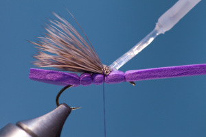 Apply super-glue to butts of trimmed deer hair as shown above.