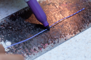 Barr the rubber legs using a Sharpie or other permanent marker.