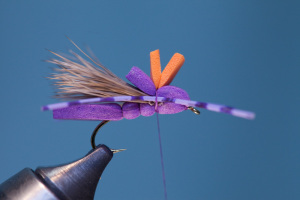 Tie in rubber legs on both sides of hopper body with 3-4 thread wraps.