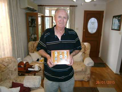 Jim with his darts awards