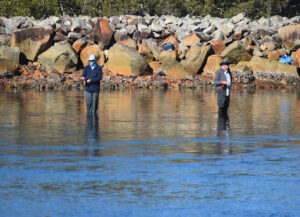 Two blokes fishing and not catching