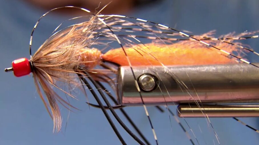 Whip finish and cut the thread. Use a hair dryer to sweep materials back and set the shape.