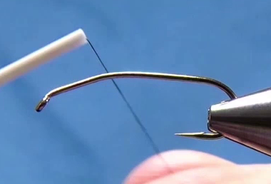 Hook shank bent upward at the front to mimic dragonfly nymph profile; barb flattened for catch-and-release fishing.