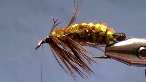 Second Mallee Fowl feather tied in, legs flaring outward near the front, enhancing lifelike leg profile.