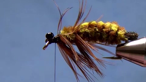 Black melted mono eyes tied in wide-set on top of the hook, giving the fly a realistic head appearance.