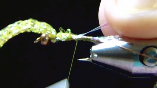 Opal tinsel tied in at the bend; body coated lightly with Sally Hansen’s Hard as Nails.