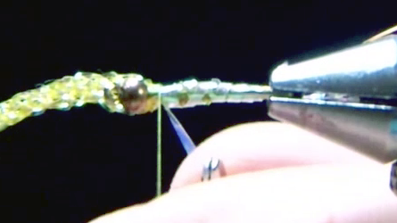 Opal tinsel wrapped up, back, and up again to form a shiny underbody.