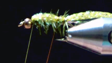 Shellback folded over the top and secured with wire at the bead; resin cured for durability.