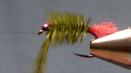 Body wrapped in touching turns from hook bend to bead.