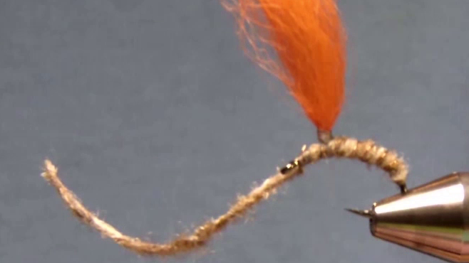 Body ribbed with copper wire and poly yarn post tied up.