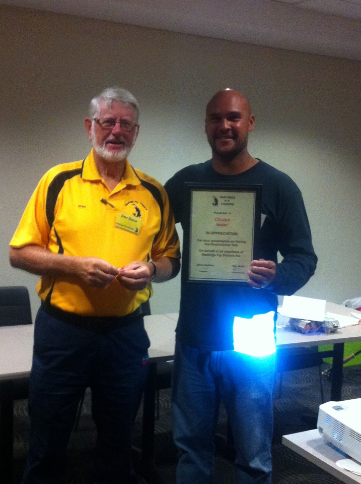 Don presenting Clinton Isaac, of Australian Fishing Lodge, with a Certificate of Appreciation from club members.