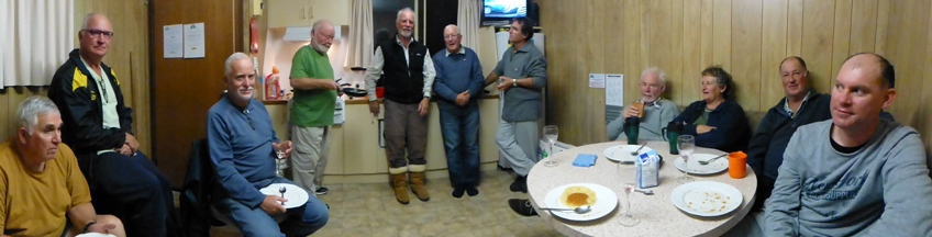 Members enjoying Bob's special pancakes with peach topping at cabin 3. Adaminaby, April 2016